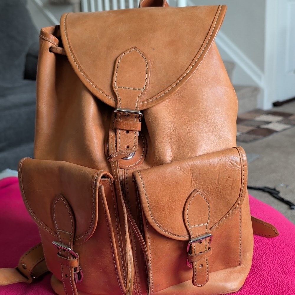 Classic Tan Leather Backpack with Buckle Pockets